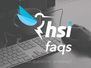 Hsi faqs graphic over picture of a keyboard on a desk