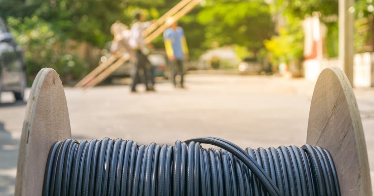 roll of fiber optic cable at construction site