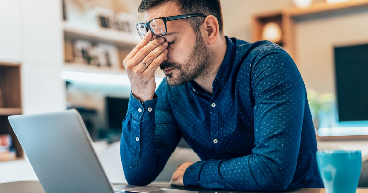 Frustrated man at computer