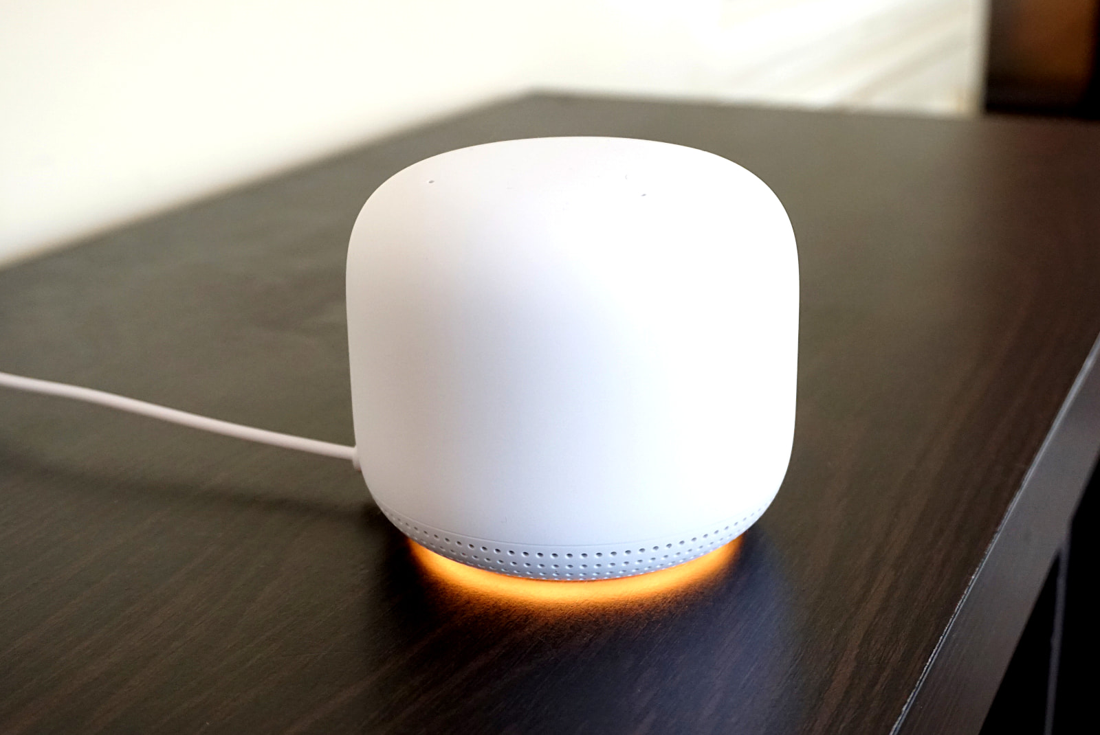Google Nest Wifi with LED ring illuminated