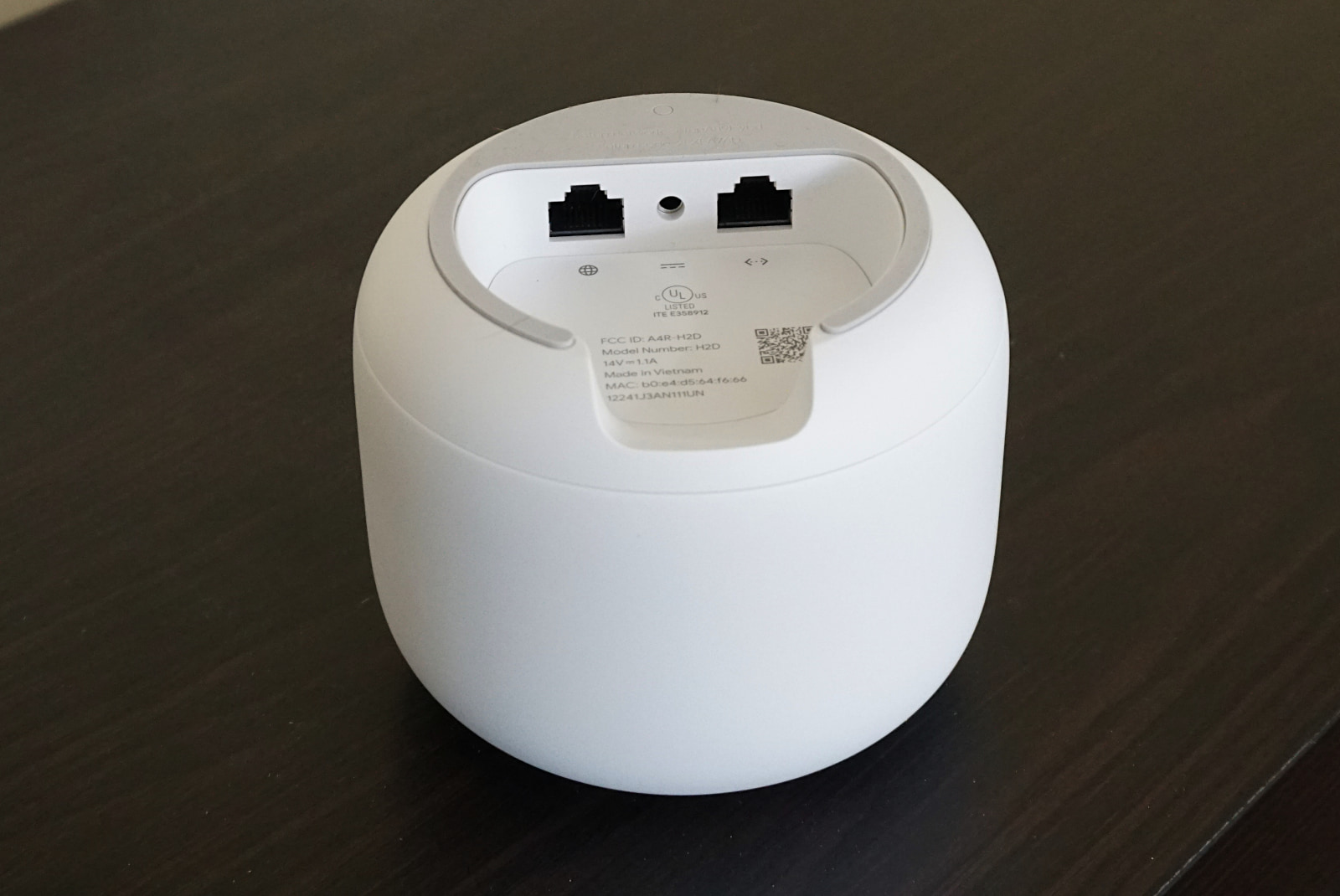 Underside of Google Nest Wifi showing two ports