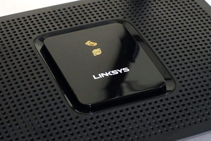 Close-up of Linksys EA8300 showing logo and lights