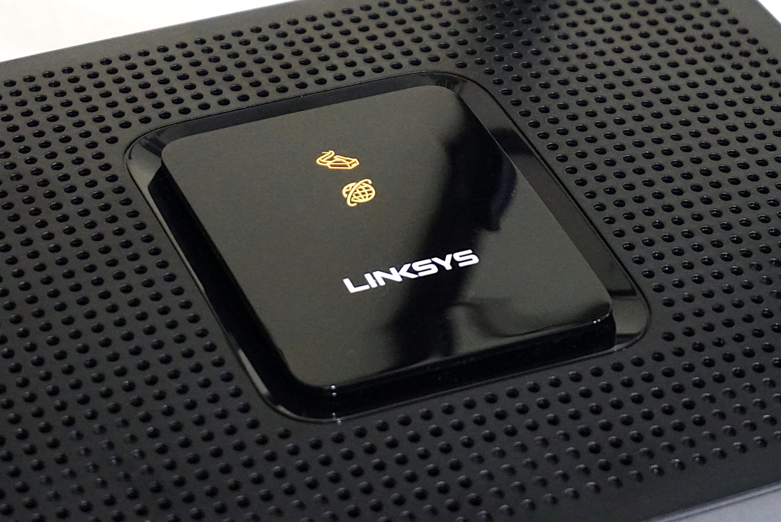 Close-up of Linksys EA8300 showing logo and lights