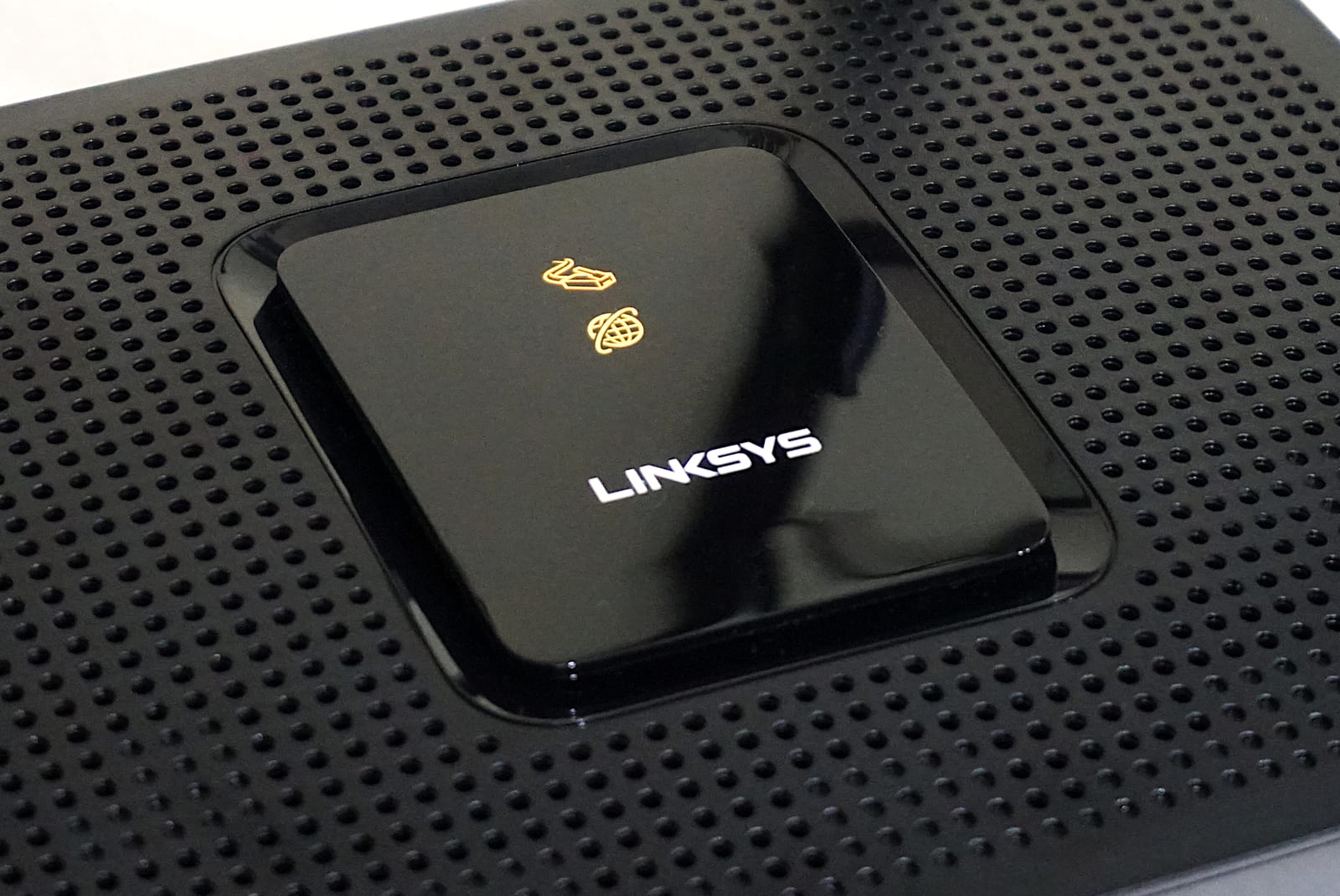 Linksys-EA8300-logo-and-lights Close-up of Linksys EA8300 showing logo and lights