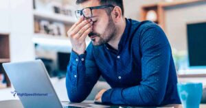 frustrated man using laptop