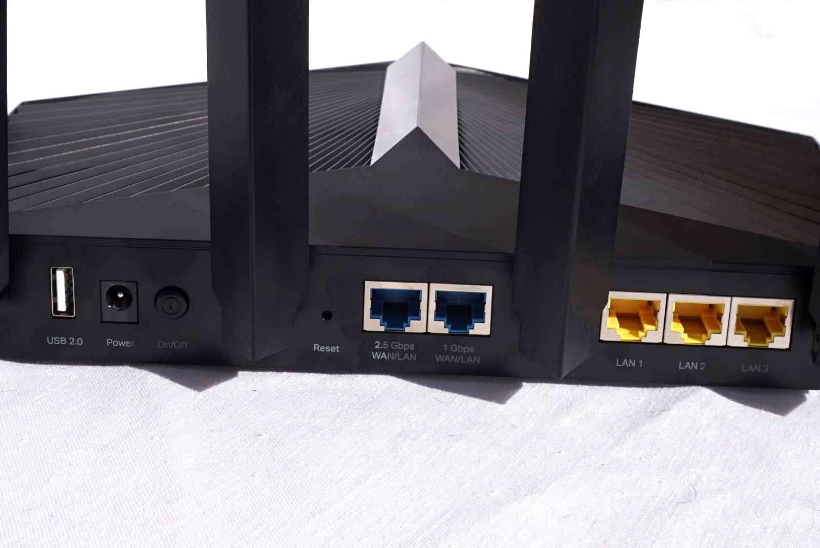 tp-link-archer-ax90-ports Read of Archer AX90 router showing many ports