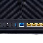 Rear of ASUS RT-AX68U showing multiple ports