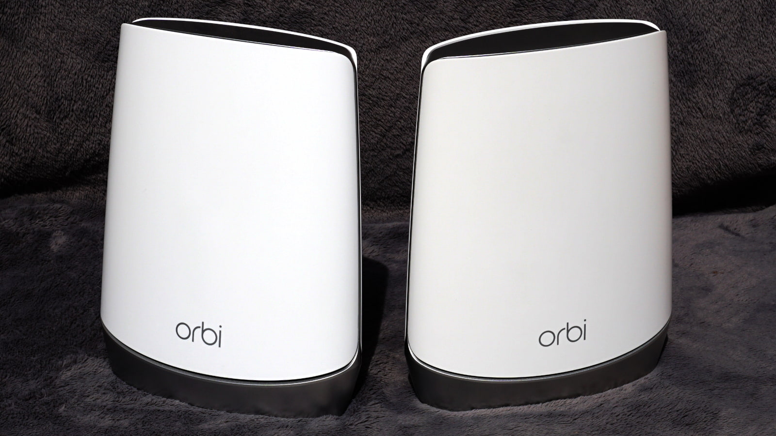 Two NETGEAR Orbi RBK752 router units