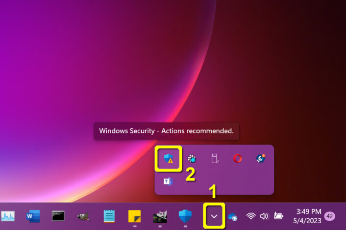 The down arrow icon on the right side of your taskbar will allow you to access the hidden icons