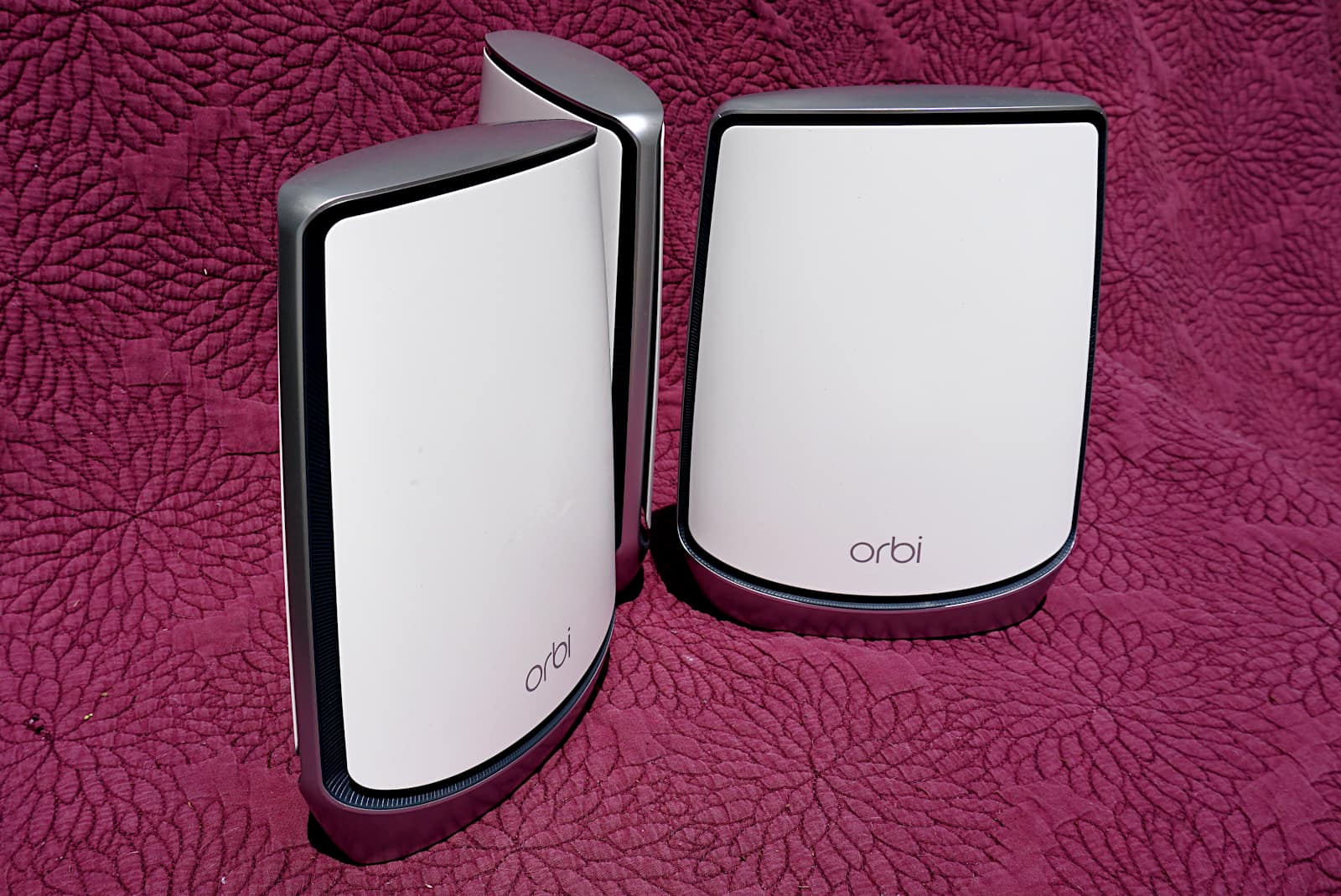 Angle shot of three Orbi RBK853 units