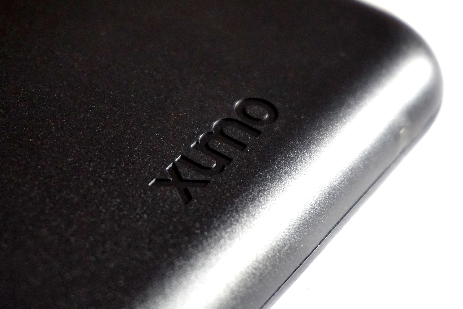 close up of Xumo Stream Box logo