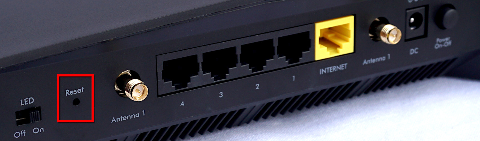 NETGEAR routers running the DumaOS platform may have a reset button on the left side