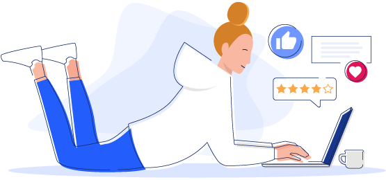 woman on ground Woman laying on stomach comparing reviews on computer