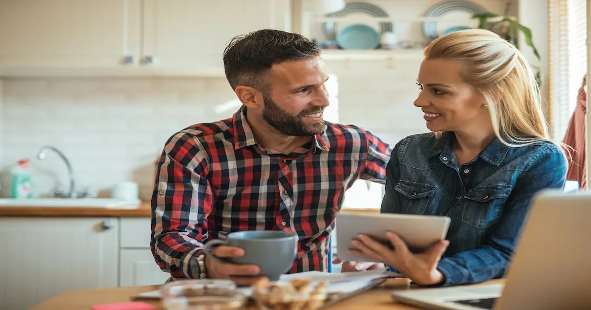 Couple enjoys internet access at home.