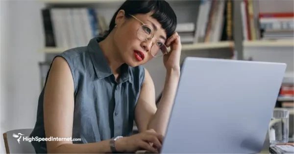 women frustrated with hotspot not working on her laptop