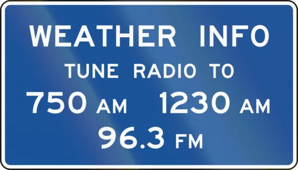 highway emergency radio sign Example of a highway advisory sign that shows radio station information for emergency alerts.